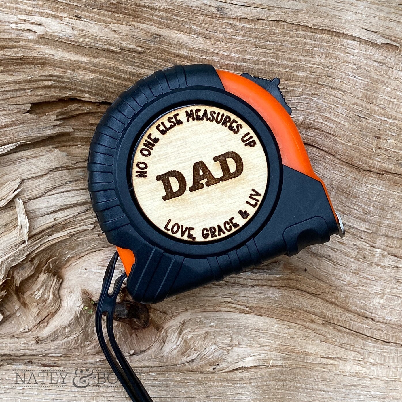 Tape measure with wood disc personalization
